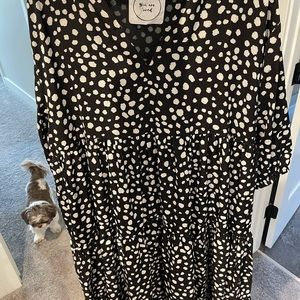 Brand New with tags. 3/4 Length. Size large - runs large (fits more like XL